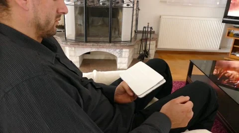 Male Model In Dark Jacket Looking At Ipad - Tablet Technology Internet Search Stock Footage 49187035