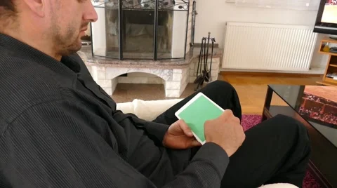 Male Model In Dark Jacket Looking At Ipad - Tablet Technology Internet Search Stock Footage 49187854