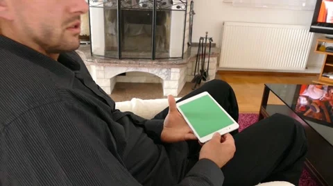 Male Model In Dark Jacket Looking At Ipad - Tablet Technology Internet Search Stock Footage 49187859