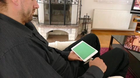 Male Model In Dark Jacket Looking At Ipad - Tablet Technology Internet Search Stock Footage 49215129