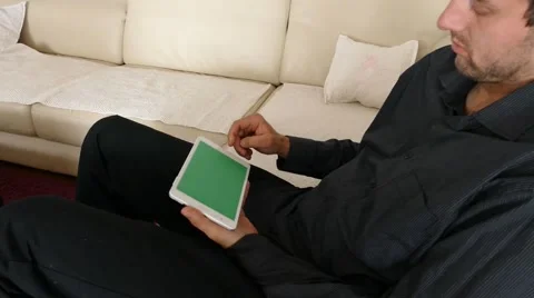 Male Model In Dark Jacket Looking At Ipad - Tablet Technology Internet Search Stock Footage 49215830