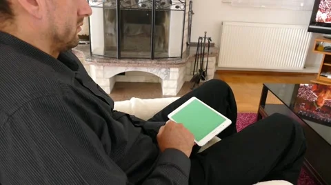 Male Model In Dark Jacket Looking At Ipad - Tablet Technology Internet Search Stock Footage 49215942