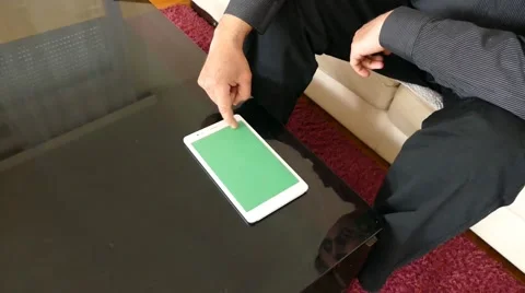 Male Model In Dark Jacket Looking At Ipad - Tablet Technology Internet Search Stock Footage 49241220