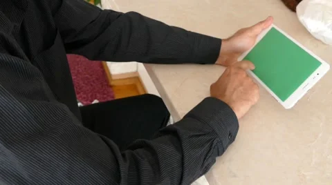 Male Model In Dark Jacket Looking At Ipad - Tablet Technology Internet Search Stock Footage 49242430