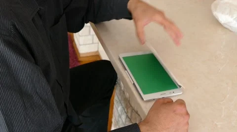 Male Model In Dark Jacket Looking At Ipad - Tablet Technology Internet Search Stock Footage 49281396