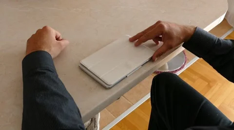 Male Model In Dark Jacket Looking At Ipad - Tablet Technology Internet Search Stock Footage 49282489