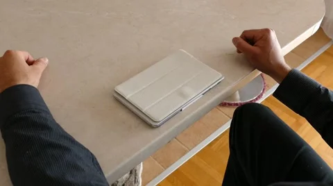 Male Model In Dark Jacket Looking At Ipad - Tablet Technology Internet Search Stock Footage 49283362