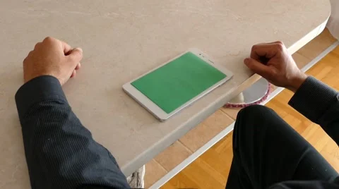 Male Model In Dark Jacket Looking At Ipad - Tablet Technology Internet Search Stock Footage 49283529