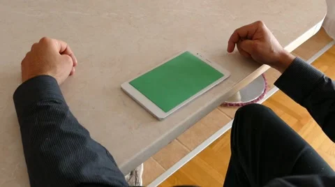 Male Model In Dark Jacket Looking At Ipad - Tablet Technology Internet Search Stock Footage 49283791