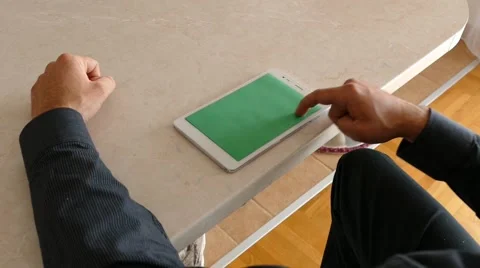 Male Model In Dark Jacket Looking At Ipad - Tablet Technology Internet Search Stock Footage 49305300