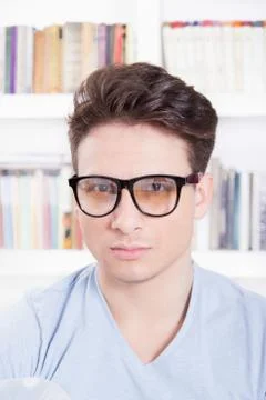 Male model with glasses posing Stock Photos