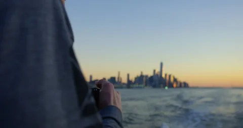 Male Model Photographing Beautiful Sunset and Beautiful Skyscrapers In NYC Stock Footage 112182553