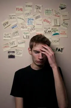 Male model posing with negative sticky notes Stock Photos