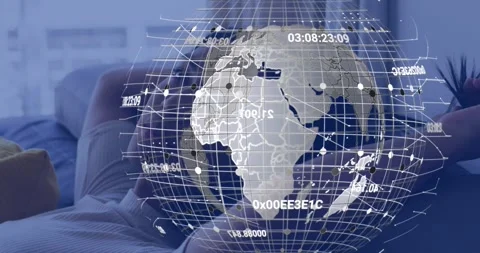 Male model reclining on sofa using phone causing globe speeding up overlay Stock Footage 318260708