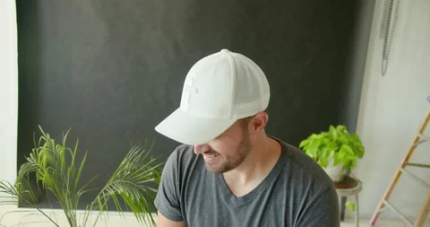 Male Model Smiling in Hat Stock Footage 139375543