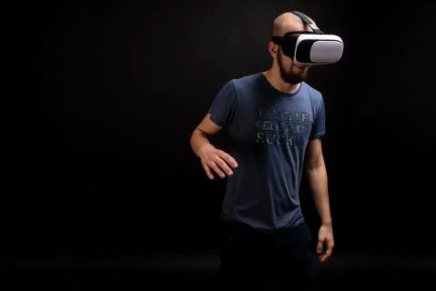 Male model using VR gear interacting while using device Stock Photos