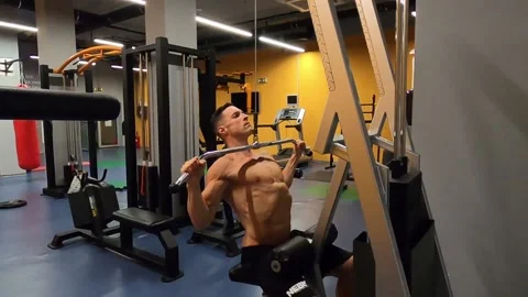 Male model workout his back muscles Video stock 138854904