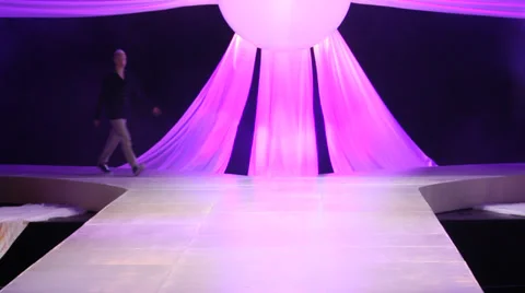 Male models walking and posing on the runway Stock Footage 34989838