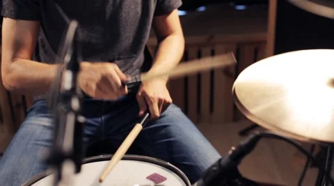 Male musician playing drums and cymbals at concert Stock Footage
