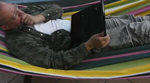 Male - with Notebook on Hammock 스톡 동영상 10575609