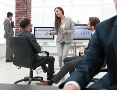 A male office worker browsing the computer for information Stock Photos