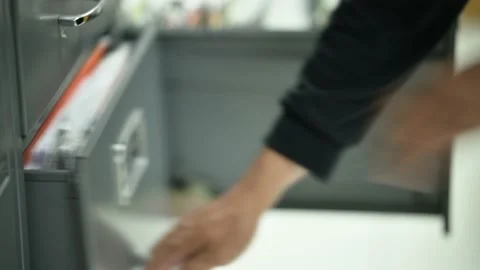 Male officials are managing documents at the office. Видео 136529403