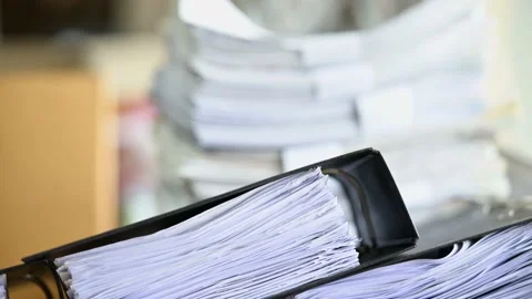 Male officials are managing documents at the office. Stock-Footage 136529655