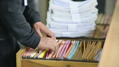 Male officials are managing documents at the office. Stock-Footage 136529918