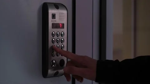 Male opens electronic code lock. man hand entering security system code Stock Footage 164211746