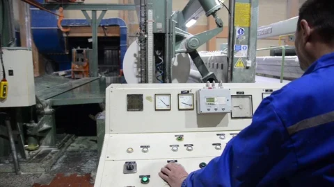 Male operator in front of machine operating console in factory. Worker. Industry Видео 127197895