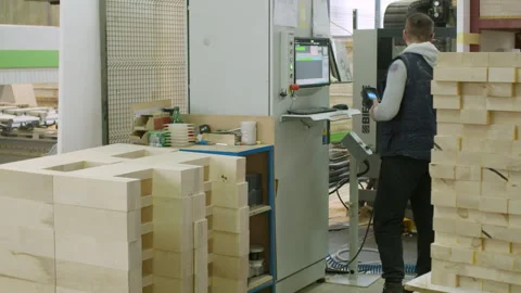 Male Operator Using CNC Router Machine for Cutting and Shaping Wood Precisely 스톡 동영상 279244660