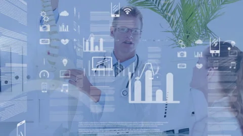 Male physician pointing spinal model, explaining medical data as AR charts Stock Footage 331085312