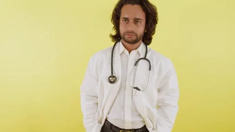Male Physician in Thoughtful Expression Stock Footage 290409144