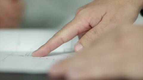 Male Pointing at Papers During an Office Consultation 库存影片 40648142
