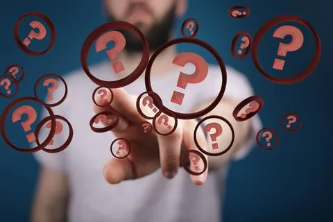 Male pointing at question mark bubbles Stock Photos