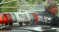 Male police officer in charge event securing, safety guard, duty HD Footage