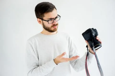 Male potographer thinking Stock Photos
