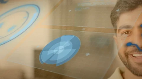 Male presenter presenting on playback tech holo UI animating rotating disk Stock Footage 333838060