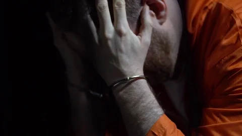 Male Prisoner Head Hands Regret Sad Soli... | Stock Video | Pond5