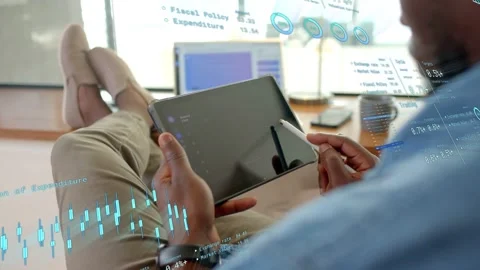 Male pro reclining tapping tablet and switching candlestick charts HUD, Stock Footage 332981481