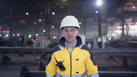 A male process engineer works on a personal computer. Portrait of a professional Stock Footage 237555638