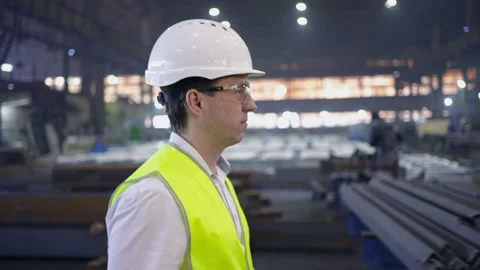 A male process engineer works on a personal computer. Portrait of a professional Stock Footage 237562935