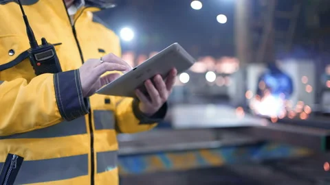 A male process engineer works on a personal computer. Portrait of a professional Stock Footage 240085508
