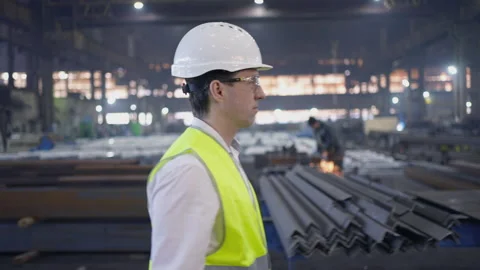 A male process engineer works on a personal computer. Portrait of a professional Stock Footage 240086529