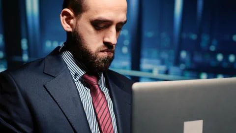 Male professional server IT engineer using laptop in data center Stock Photos