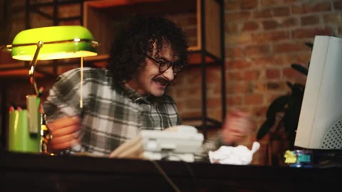 Male programmer from 80s creating new software, celebrating program launch Stock Footage 321072198