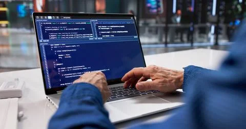 Male Programmer Codes Secure Software For Online Data Protection Project Stockfoto's