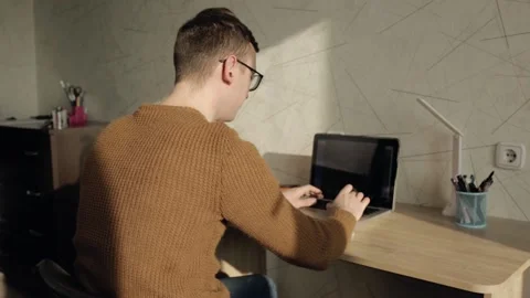 Male programmer developing software and writing code while tying on laptop Stock-Footage 147670905