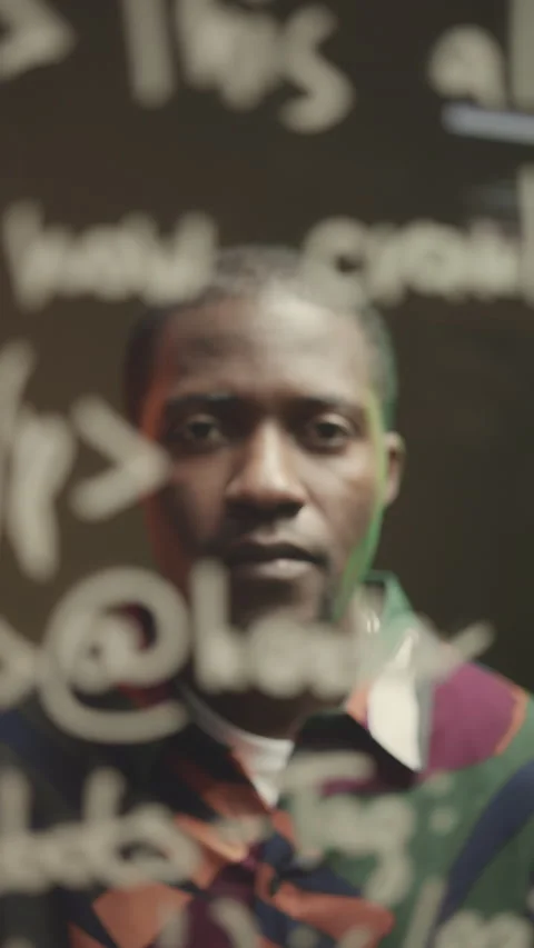 Male Programmer Examining Computer Cmd on Glass Board Stock Footage 259937639