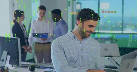 Male programmer placing earbud for coding on laptop, team reviewing binder, Stock Footage 317159484